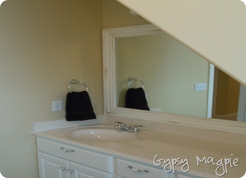 Upgrading a Boring Builder Bathroom Mirror {Gypsy Magpie}