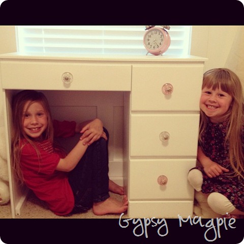 my cuties and my childhood desk with new knobs {Gypsy Magpie}