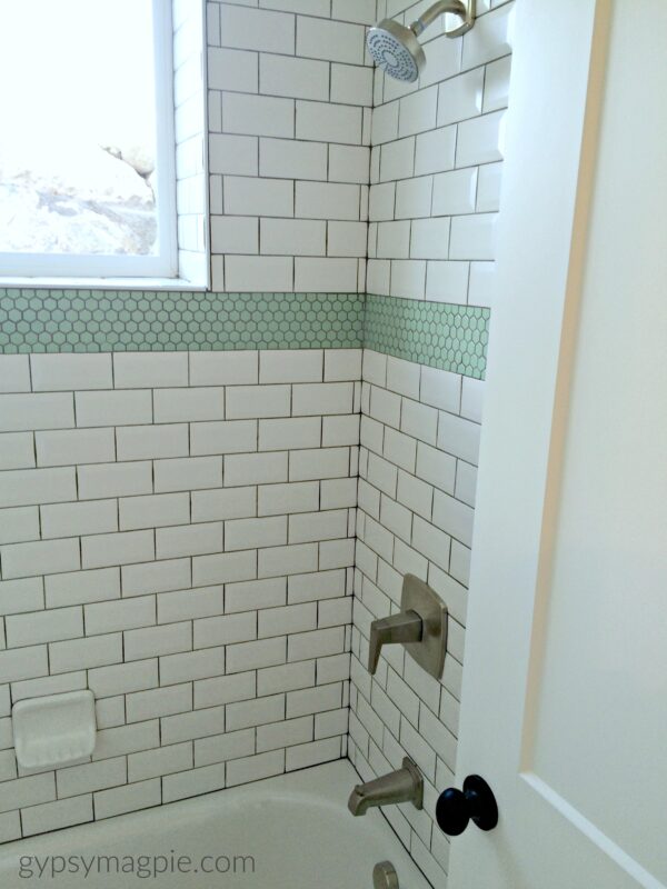 Minty green hex tiles make this subway tile pop! | Gypsy Magpie