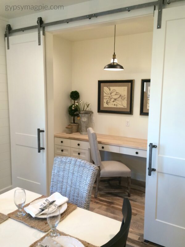 Loving this darling little nook with the rolling barn doors off the dining room! | Gypsy Magpie