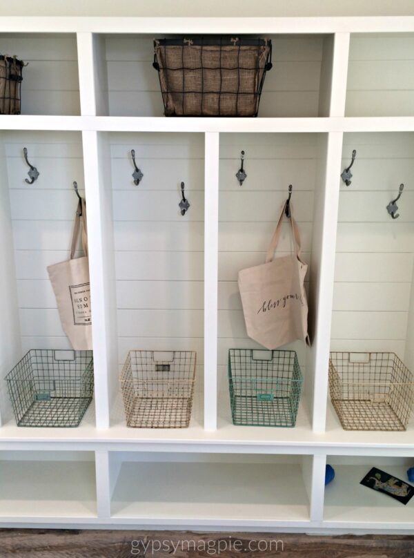 I love these simple mudroom cubbies! The double hooks in each cubby could be so handy and double the hanging space! | Gypsy Magpie