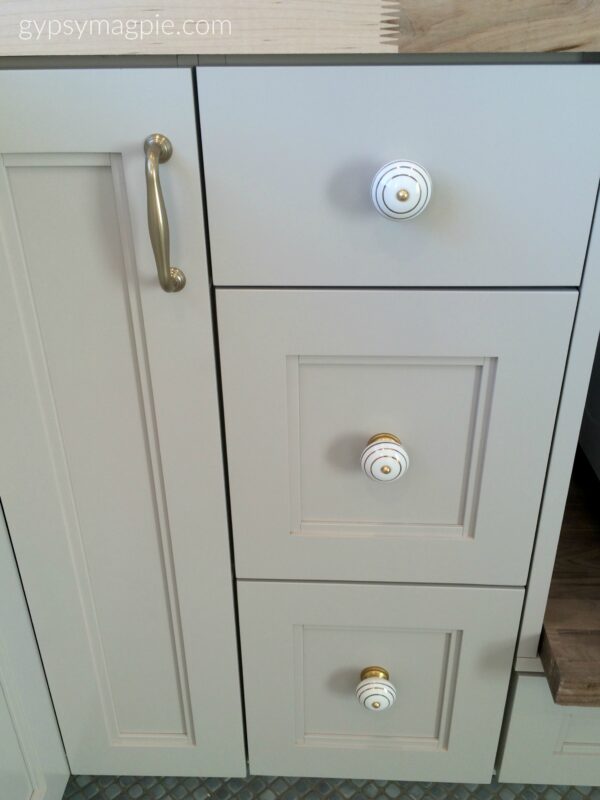 Grey cabinets and brass hardware go so pretty together! Keeps things from looking cold. | Gypsy Magpie