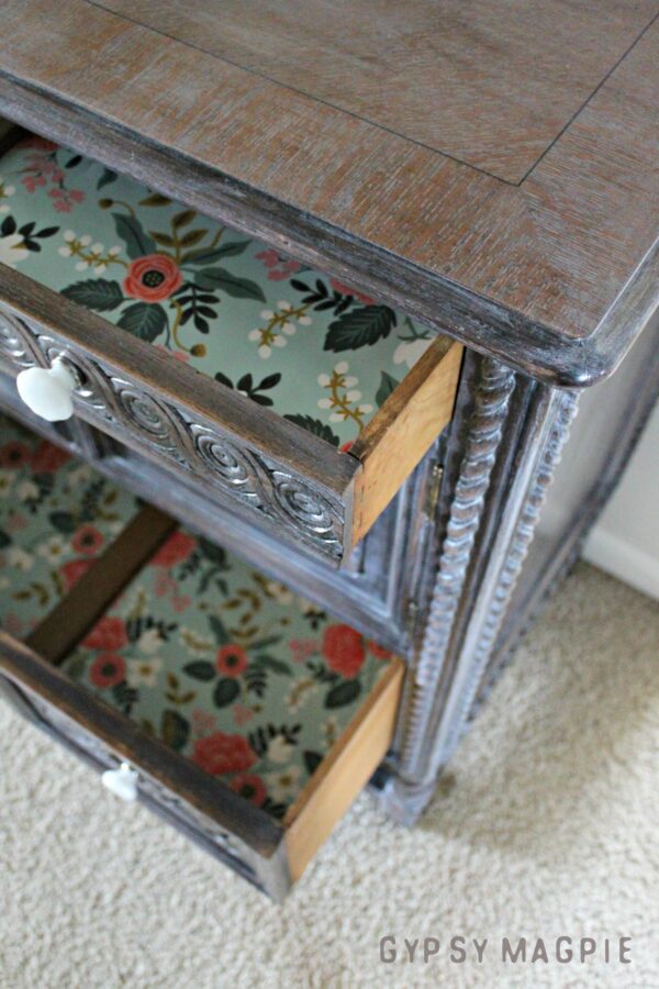 Pretty paper adds a pop of color to the inside of this gorgeous antique cabinet | Gypsy Magpie