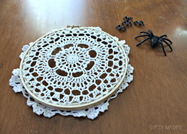 Make this whimsical spider web doily for Halloween! So simple, cute, and inexpensive! | Gypsy Magpie