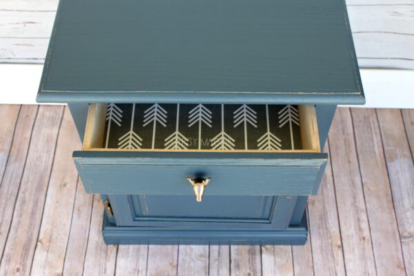 Adorable navy dresser with papered drawer and deer head knob | Gypsy Magpie