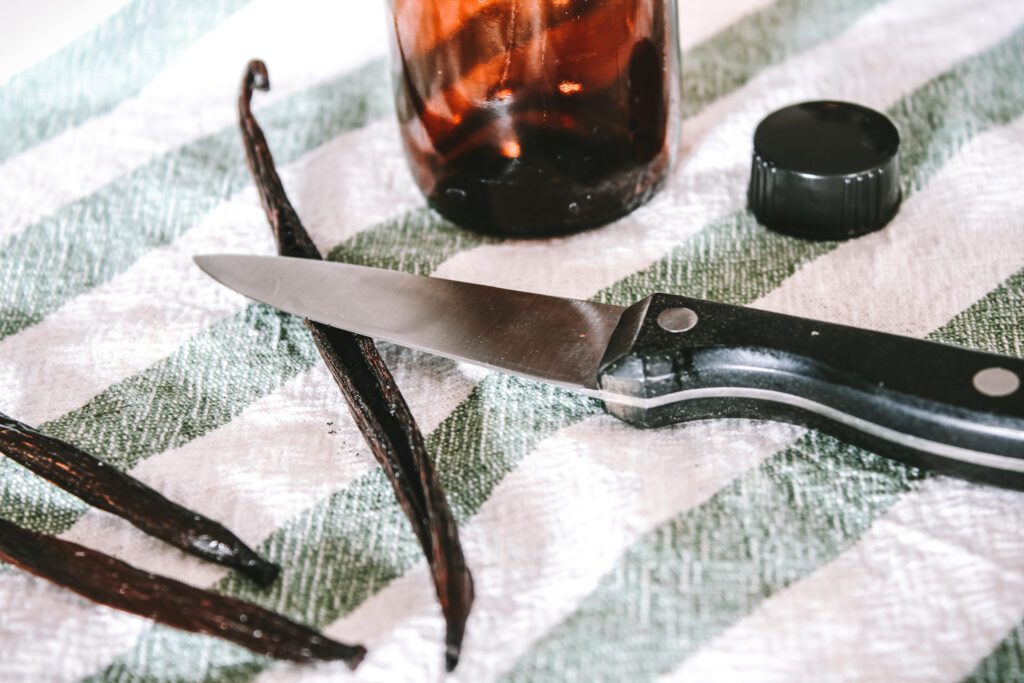 slice the vanilla beans lengthwise before bottling | gypsy magpie