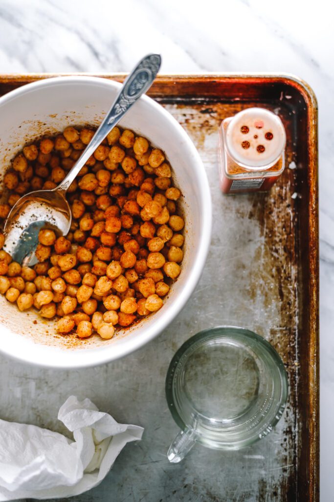 Sprinkle chili lime seasoning on garbanzo beans and roast for a crispy snack!