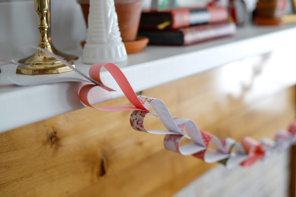 Little paper hearts made into the sweetest garland for Valentine's Day